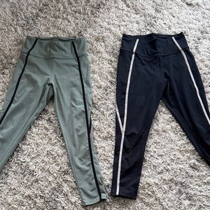 Danskin Black and Olive Leggings 
Size Medium 
Side pocket 
16/ 34 for both